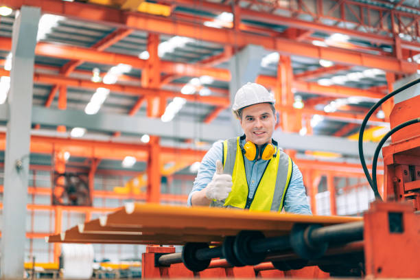 istock Smart professional Caucasian quality control,Industrial,factory engineer,technician,worker man in safety helmet inspect steel metal sheet at machine production,manufacture worker concept in copy space 1419371101