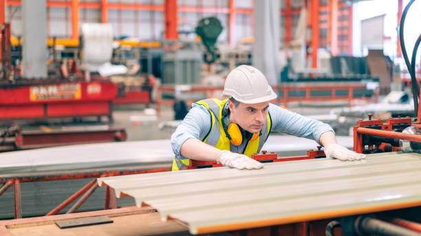 istock Smart professional Caucasian quality control,Industrial,factory engineer,technician,worker man in safety helmet inspect steel metal sheet at machine production,manufacture worker concept in copy space 1419371649