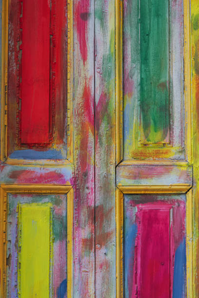 Multi-colored painted wooden door. stock photo