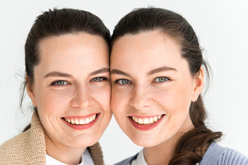 close-up faces female twins