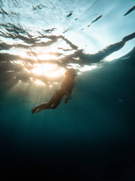 istock Happy Young Boy Exploring Underwater At The Seaside 1419386781