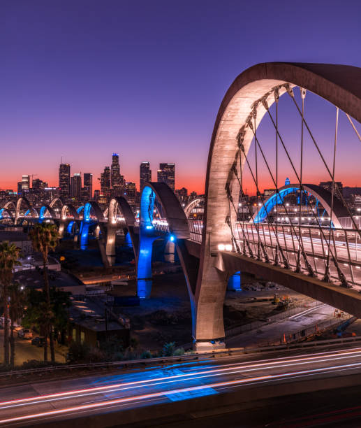 Nightlife on the 6th Street Bridge in Los Angeles, California Dusk on LA's newly constructed 6th street bridge sixth street bridge stock pictures, royalty-free photos & images