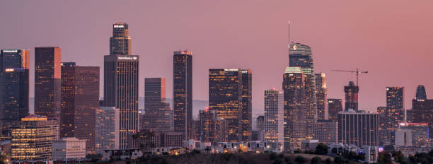 Downtown Skyline at Dusk Los Angeles skyline captured at dusk los angeles traffic jam stock pictures, royalty-free photos & images