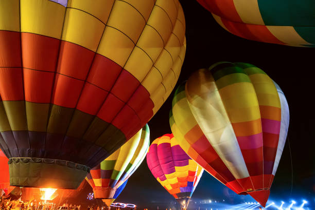 istock hot air balloons in fastival night 1419397620