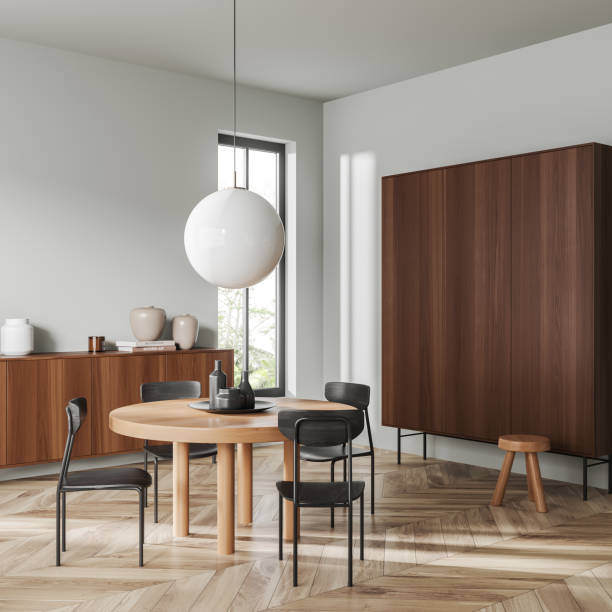 istock Light meeting interior with seats and table, cabinet and panoramic window 1419400481