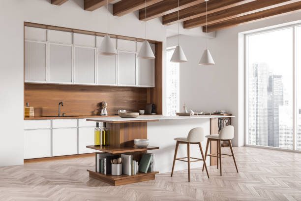 istock Light kitchen interior with countertop and seats, decoration and panoramic window 1419402067