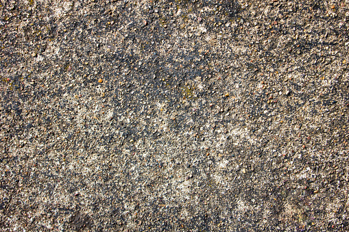 The old stone.Authentic hard grunge stone texture.Ancient natural stone background.