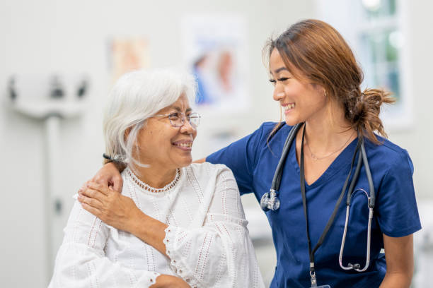 istock Nurse Comforting a Senior Patient 1419420237