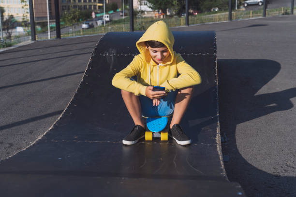 istock Child playing video game on the sport playground 1419426652