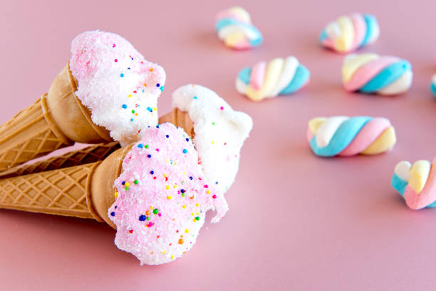 istock Dried ice cream and marshmallows on pink background 1419428289