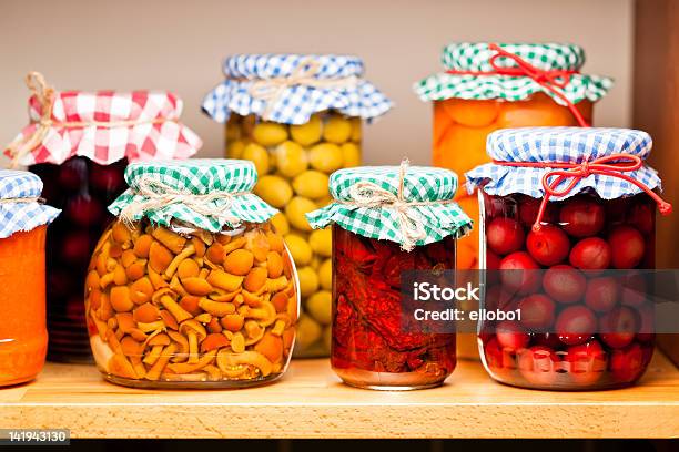 Several Jars Of Preserved Fruits And Vegetables Stock Photo - Download Image Now - Apricot, Autumn, Can