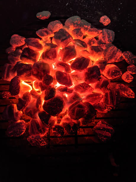 istock Red Hot Charcoal Coals burning inside Grill 1419438350