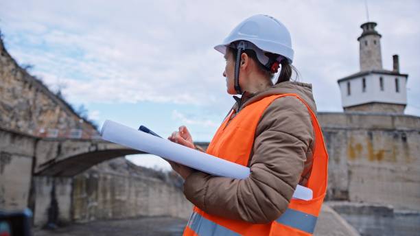 istock Female engineer working in hydroelectric dam. Ecology orientated. Renewable energy systems. 1419443340