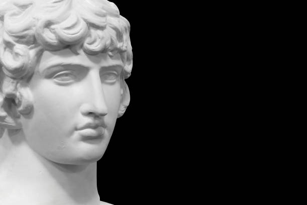 istock white plaster male statue isolated on black background 1419443984