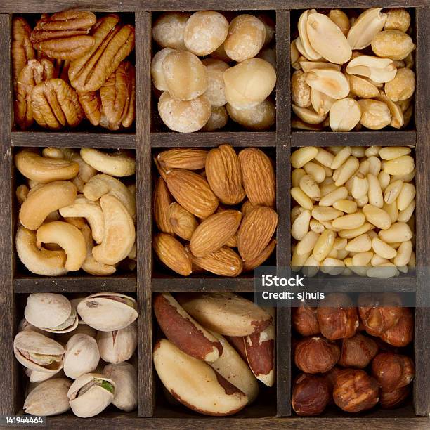 Assorted Nuts For A Background Stock Photo - Download Image Now - Almond, Brazil, Brown