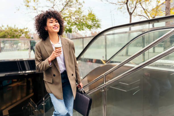 istock woman leaving the subway station with a briefcase 1419444724