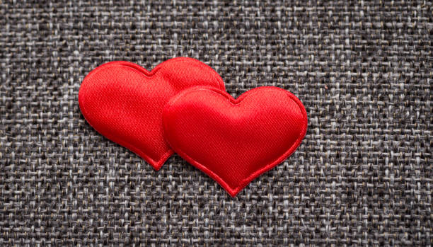 istock Red hearts on gray textile background. Close-up macro 1419448375