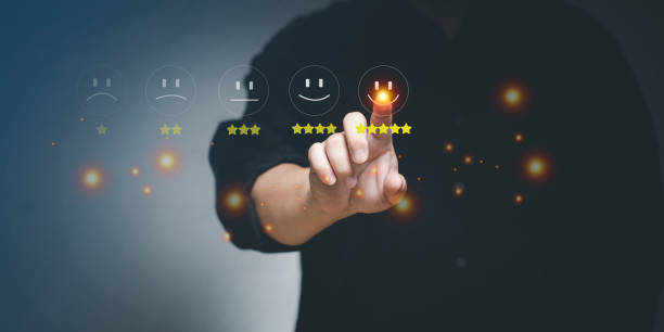 istock Businessman pressing smiley face emoticon on virtual touch screen. Customer service evaluation concept. 1419459412