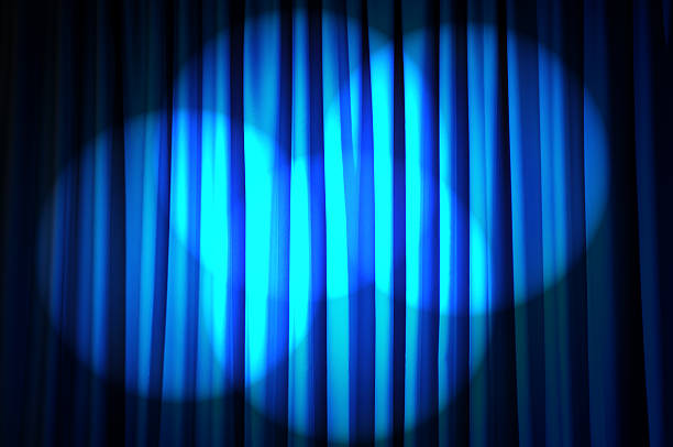 istock Brightly lit curtains in theatre concept 141945949