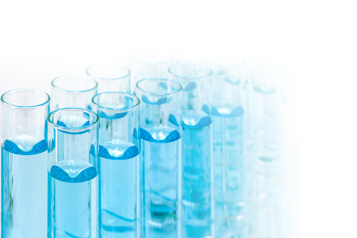 science and laboratory background of test tubes with blue liquid in laboratory
