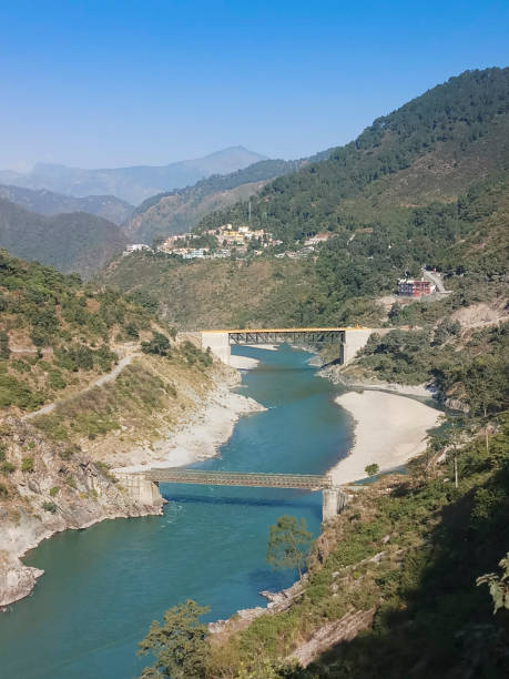 holy ganges or ganga river , flowing through himalayan mountians of rishikesh, uttarakhand, india. - uttarakhand bildbanksfoton och bilder