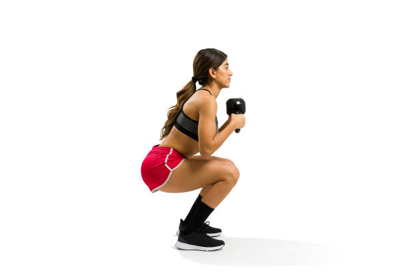 istock Beautiful young woman exercising with cross training 1419463070