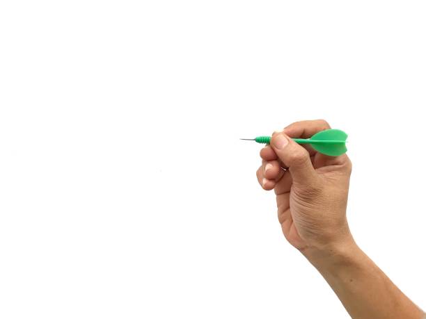 istock hand throwing darts on white isolated background 1419478170