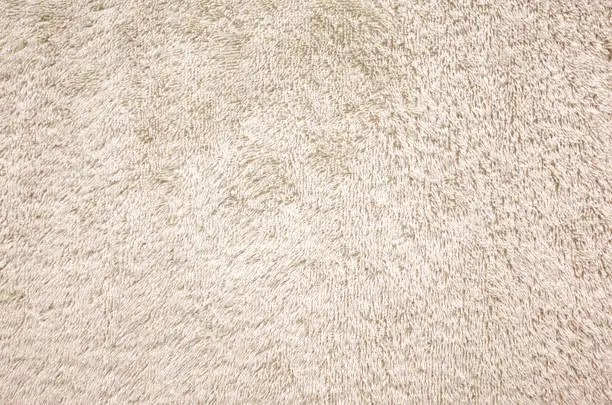 Photo of Light beige towel texture background