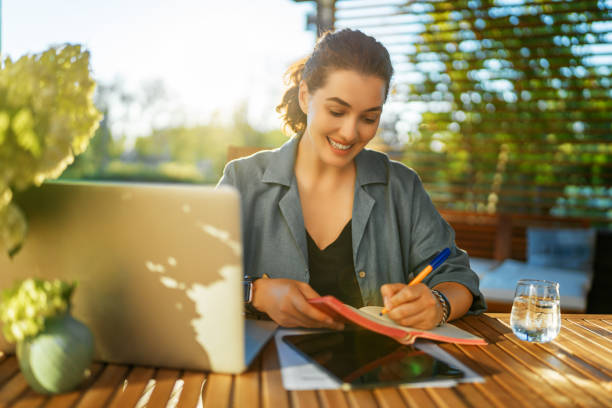 istock woman is working sitting on the patio 1419489788