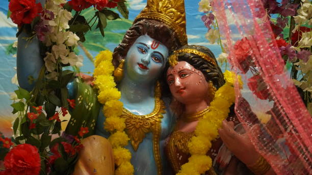 istock radha-krishna statue decorated with flowers image hd. 1419496373