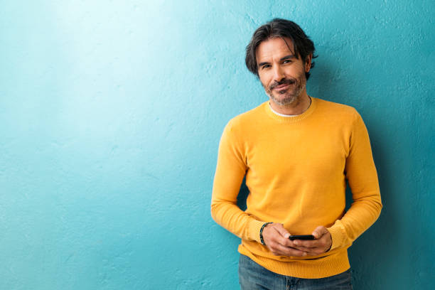 istock Mature Business Man Using Phone 1419500165