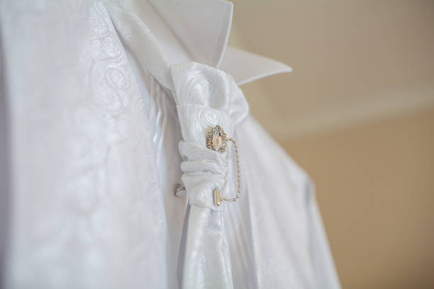 istock White wedding shirt with decorations. Details closeup 1419508891