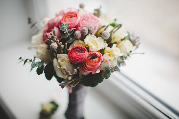 istock Colorful wedding bouquet on the windowsill in a vase 1419509721