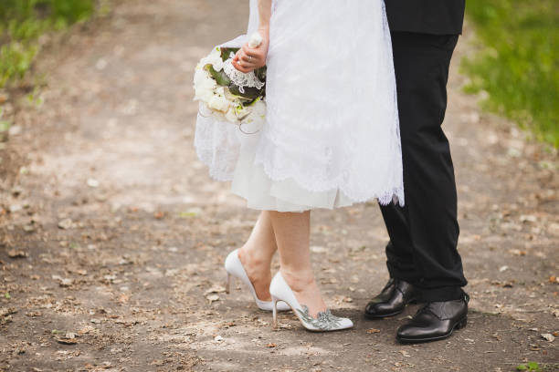 istock Bright wedding bouquet in hands of the bride 1419509813