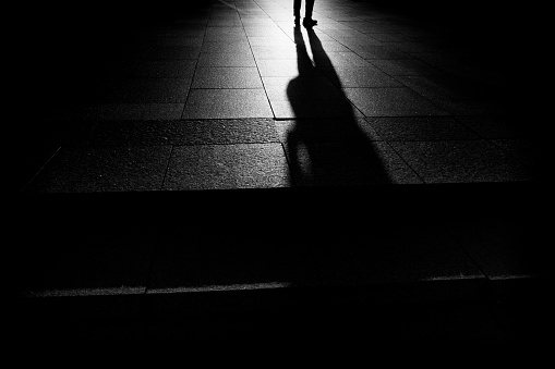 Man silhouette walking in the city