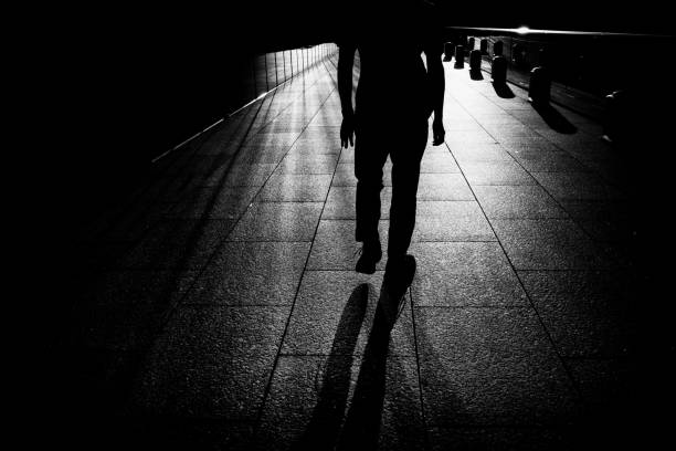 istock Man silhouette walking in the city 1419510053