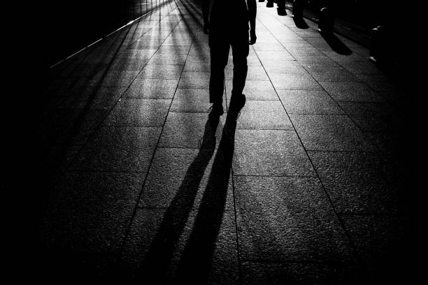 istock Man silhouette walking in the city 1419510059