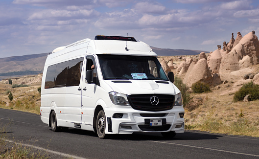 Cappadocia, Turkey 11.08.2022:White passenger Mercedes-Benz Sprinter in Turkey. This model is the most popular minibus in Europe