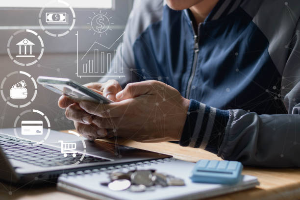istock Online banking concept. Man hand using mobile smartphone with a dollar icon, online transaction application, e-commerce, internet investment, money transfer, payment, online shopping, digital wallet. 1419515204