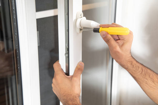 istock Worker fixing window with screwdriver. Installing new plastic window in house 1419515388