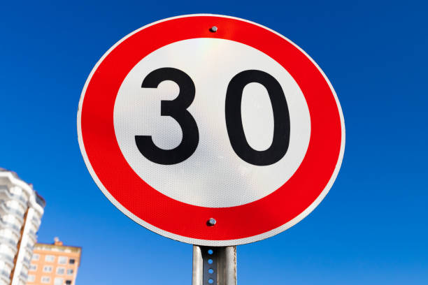 istock Speed limit road sign is under blue sky 1419519926