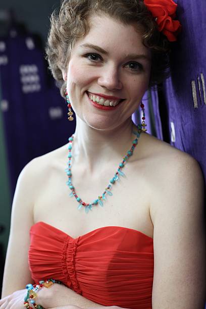 20 something attractive female, make up, necklace, smiling stock photo