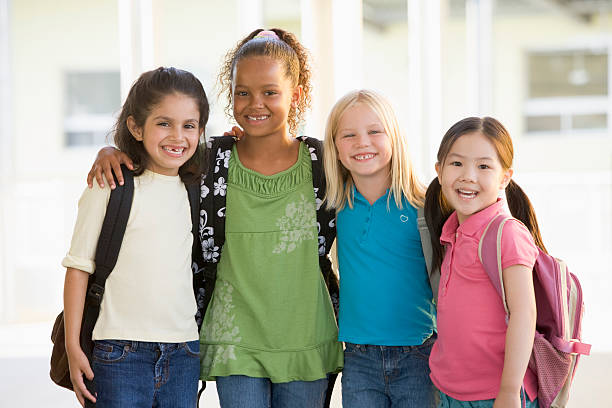 istock Kindergarten girls standing together 141952495