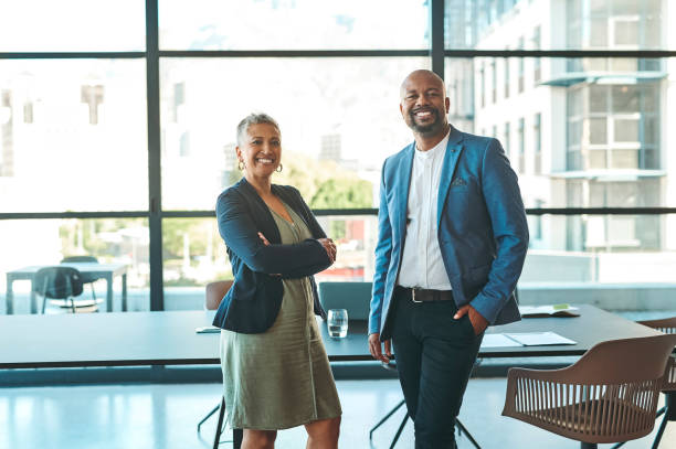 istock Manager, leader or CEO working together with a boss or leadership mentor as a management team in an office. Business, meeting and marketing with a vision and mission for company growth and strategy 1419529211