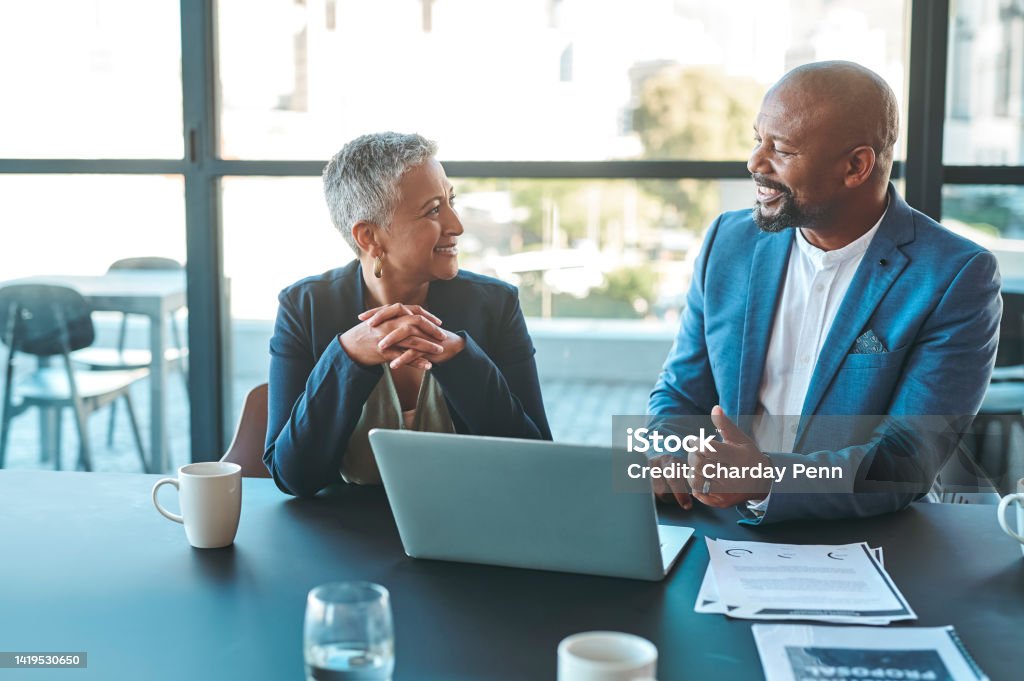 Leadership, management and teamwork between CEO and senior manager in a business meeting in the office. Leader and boss working as a team to plan the vision and mission for growth and development Business Stock Photo
