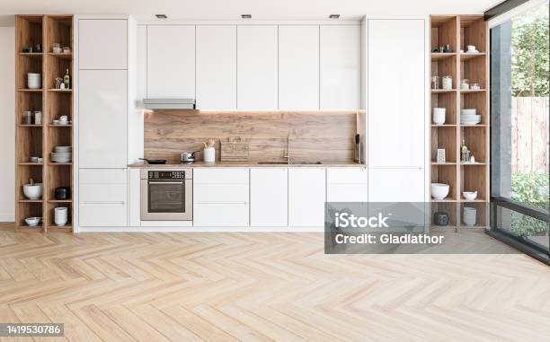 Modern White Kitchen With Rectangular Breakfast Kitchen Island With Stools Stock Photo - Download Image Now