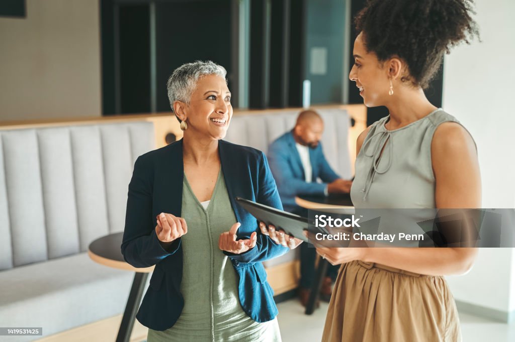 Communication, consulting and planning, business women meeting in the work lobby. A woman in leadership, ceo, team leader or coaching mentor, collaboration and motivation for office employee success Teaching Stock Photo