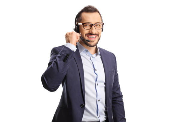 istock Male call operator with headset smiling at camera 1419532547