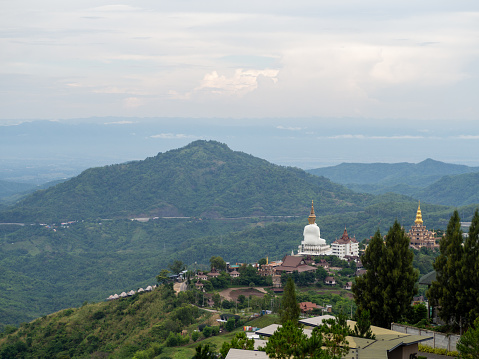 White buddha and mountain at Phetchabun, Thailand.