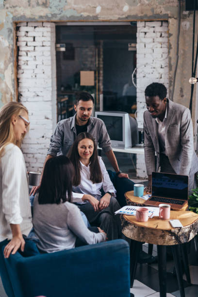 istock People in office talking during informal meeting. 1419534658